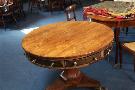 A 19th century circular rosewood drum table, stamped Gregory & Co, Regent Street, London, W.3ft 6in.